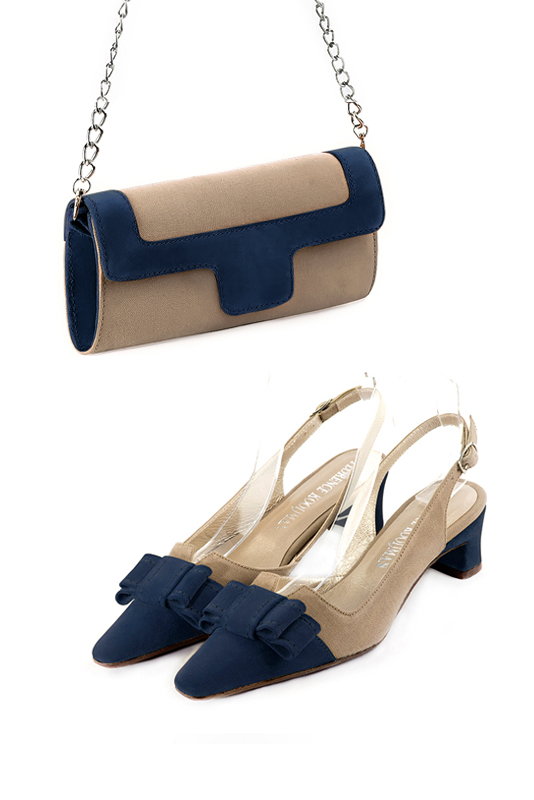 Women's tan beige and navy blue luxurious elegant clutch for ceremonies, weddings and evenings out. - Worn view